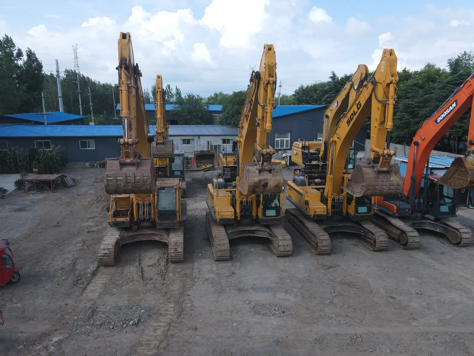 Elevated view of excavators and yard buildings in Zaozhuang